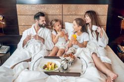 enjoying-breakfast-family-having-breakfast-bed-enjoying-it